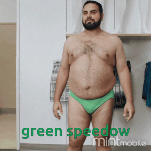 A Shirtless Man In Green Underwear With The Words Green Speedow Mintmobile On The Bottom GIF