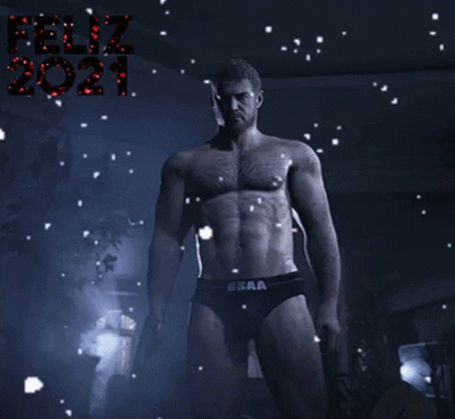 A Shirtless Man In Underwear Stands In Front Of Feliz 2021 GIF