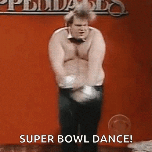 A Shirtless Man Is Dancing In Front Of A Red Wall With The Words `` Super Bowl Dance '' . GIF