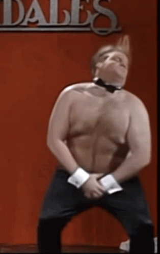 A Shirtless Man Is Dancing In Front Of A Sign For Dales GIF