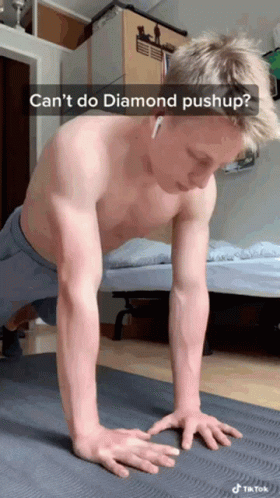 A Shirtless Man Is Doing Push Ups On A Yoga Mat With The Caption " Can 'T Do Diamond Pushup " GIF