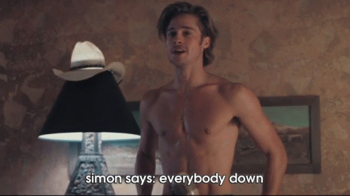A Shirtless Man Is Holding A Bottle And Says " Everybody Down " GIF