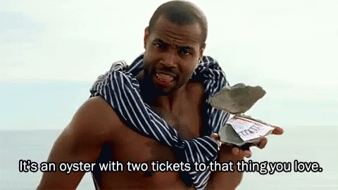 A Shirtless Man Is Holding An Oyster With Two Tickets To That Thing You Love .. GIF