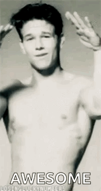 A Shirtless Man Is Making A Peace Sign With His Hands . GIF