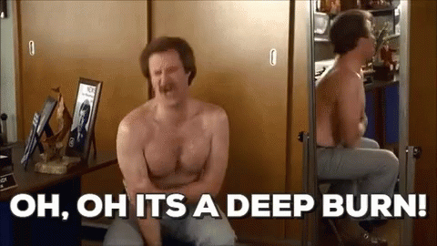 A Shirtless Man Is Sitting In Front Of A Mirror And Saying `` Oh , Oh It 'S A Deep Burn '' . GIF