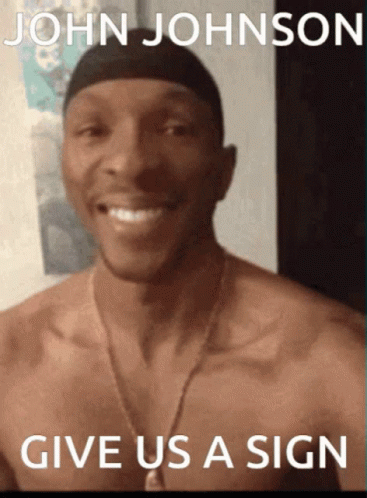 A Shirtless Man Is Smiling In Front Of A Sign That Says John Johnson GIF