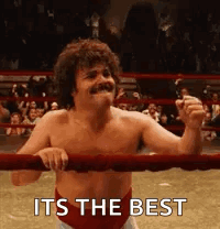 A Shirtless Man Is Standing In A Boxing Ring With The Words `` It 'S The Best '' Written Above Him . GIF