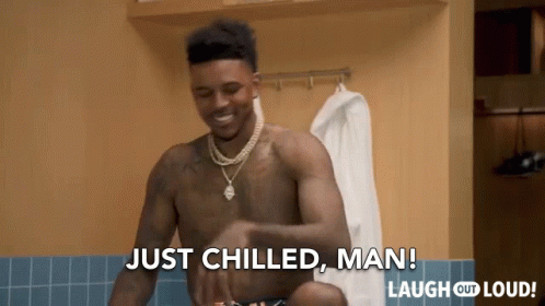A Shirtless Man Is Standing In A Locker Room And Says Just Chilled Man GIF