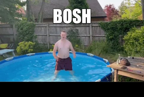 A Shirtless Man Is Standing In A Swimming Pool With The Words Bosh Above Him GIF