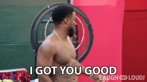 A Shirtless Man Is Standing In Front Of A Fan And Says I Got You Good GIF