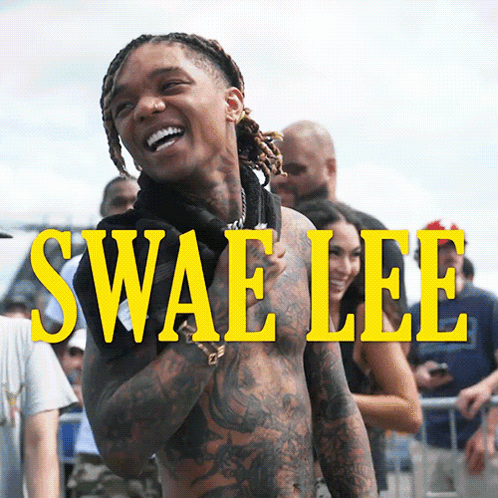 A Shirtless Man Is Standing In Front Of A Sign That Says Swaelee GIF