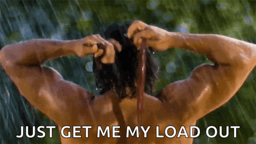 A Shirtless Man Is Taking A Shower In The Rain With The Words Just Get Me My Load Out Above Him . GIF