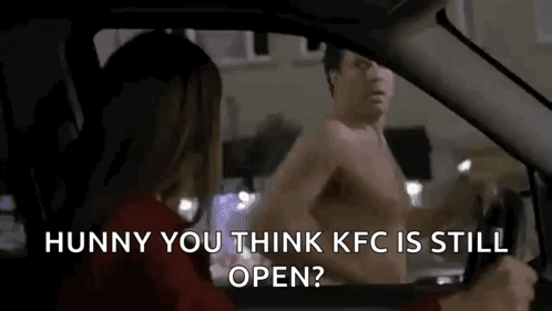 A Shirtless Man Is Talking To A Woman In A Car While Driving . GIF