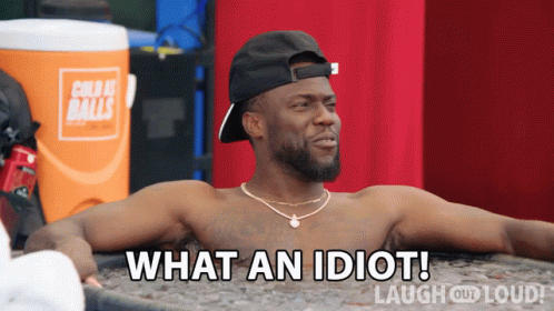 A Shirtless Man Laying In A Tub With The Words What An Idiot Laugh Out Loud GIF