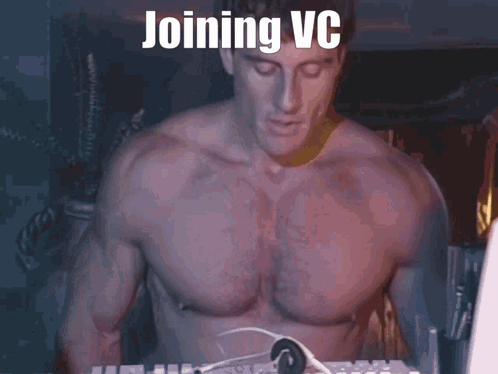A Shirtless Man Sitting In Front Of A Computer With The Words Joining Vc Written On The Screen GIF