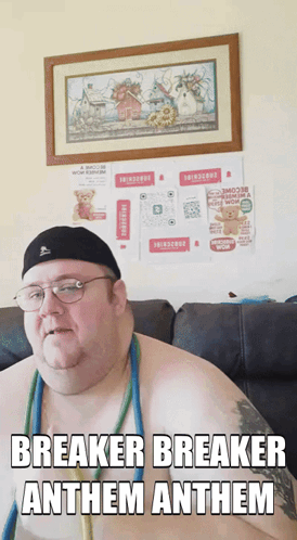 A Shirtless Man Sitting On A Couch With Breaker Breaker Anthem Anthem Written On The Bottom GIF