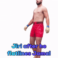 A Shirtless Man Standing In Red Shorts With The Words Jiri After He Flatlines Jamal Below Him GIF
