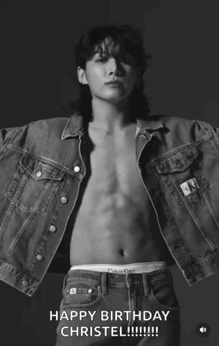 A Shirtless Man Wearing A Calvin Klein Denim Jacket GIF
