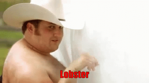 A Shirtless Man Wearing A Cowboy Hat Is Standing Next To A White Curtain And Says Lobster . GIF
