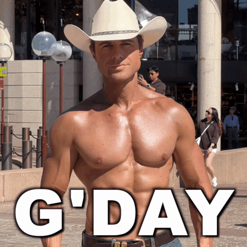 a shirtless man wearing a cowboy hat stands in front of a sign that says g'day