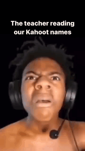 A Shirtless Man Wearing Headphones And A Microphone . GIF