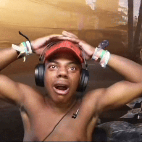 A Shirtless Man Wearing Headphones And A Red Hat With The Letter R On It GIF