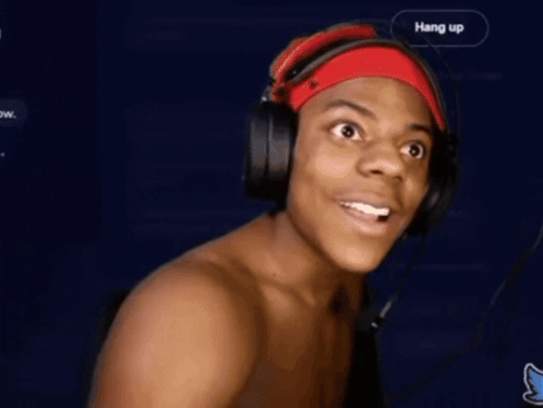 A Shirtless Man Wearing Headphones And A Red Headband Has His Mouth Wide Open GIF