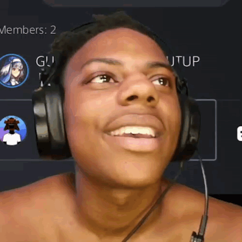 A Shirtless Man Wearing Headphones Is Smiling In Front Of A Screen That Says Members : 2 GIF