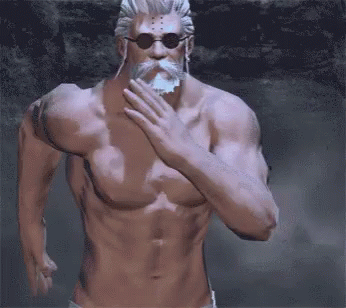 A Shirtless Man With A Beard And Sunglasses Covers His Mouth GIF