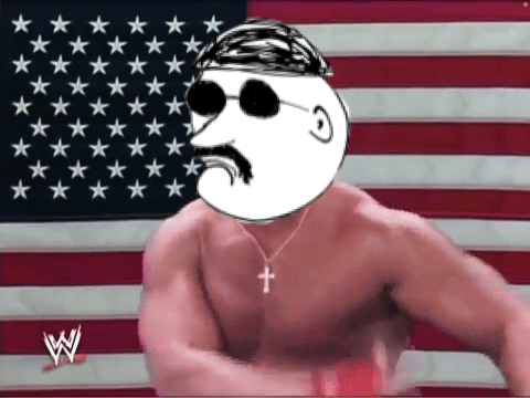 A Shirtless Man With A Cross Necklace Stands In Front Of An American Flag With Stars GIF