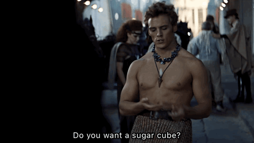 A Shirtless Man With A Necklace Says Do You Want A Sugar Cube GIF