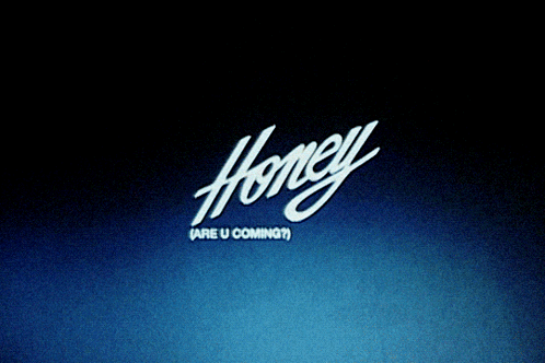 A Shirtless Man With A Tattoo On His Chest Stands In Front Of A Sign That Says Honey Are U Coming GIF