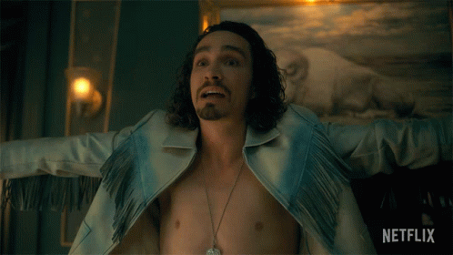 A Shirtless Man With His Arms Outstretched In Front Of A Netflix Ad GIF