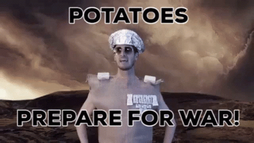 A Shirtless Man With Potatoes On His Head And The Words " Potatoes Prepare For War " On The Bottom GIF