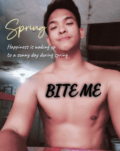 A Shirtless Man With The Word Bite Me Written On His Chest GIF