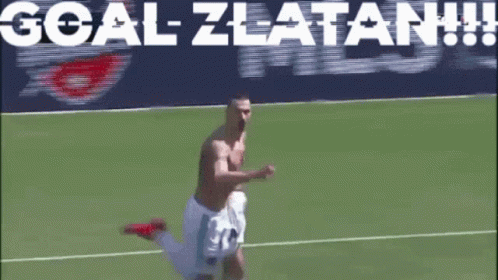 A Shirtless Soccer Player Is Jumping In The Air With The Words Goal Zlatan Written Behind Him GIF