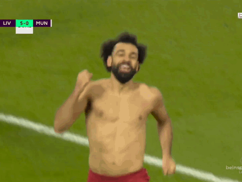 A Shirtless Soccer Player With The Number 10 On His Shorts Celebrates GIF