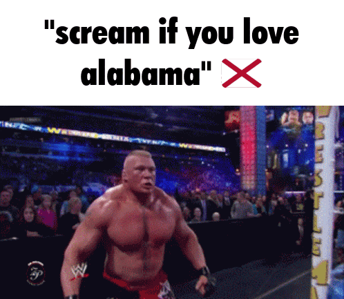 a shirtless wrestler is screaming in front of a crowd with the words " scream if you love alabama "