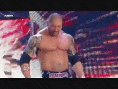 A Shirtless Wrestler With A Belt That Says Batista GIF