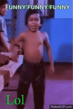 A Shirtless Young Boy Is Dancing In A Room With His Hands In The Air . GIF