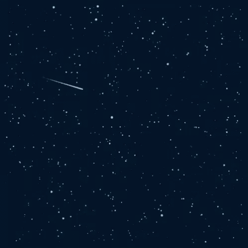 A Shooting Star In The Night Sky With Many Stars GIF