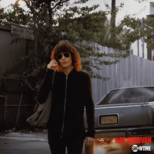 a showtime ad for ray donovan features a woman talking on a cell phone