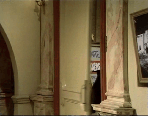 A Sign On A Wall That Says Granite Acre On It GIF