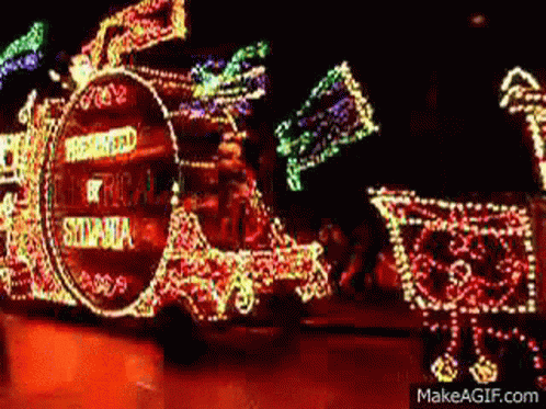 A Sign That Is Lit Up At Night That Says Reserved Electric GIF