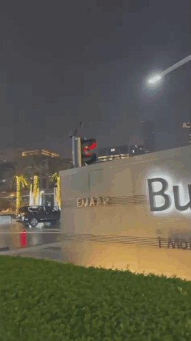 A Sign That Says ' Aifa Grand Boulevard ' In Arabic GIF