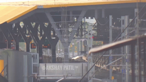 A Sign That Says Akshay Pattil On It GIF