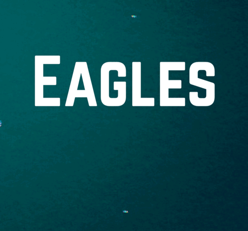 A Sign That Says Eagles Win On A Blue Background GIF