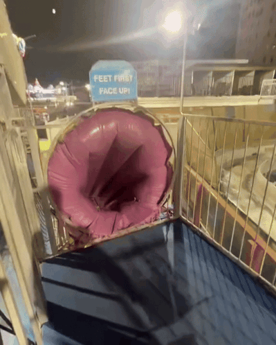 A Sign That Says " Feet First Face Up " On A Slide GIF