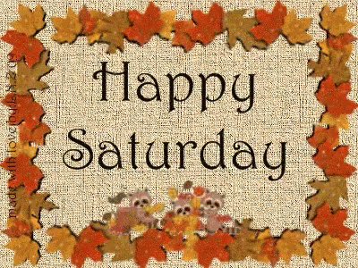 A Sign That Says Happy Saturday Surrounded By Autumn Leaves GIF