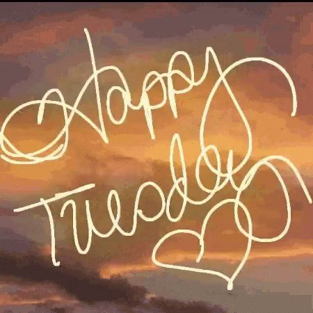 A Sign That Says " Happy Tuesday " With A Heart In The Middle GIF